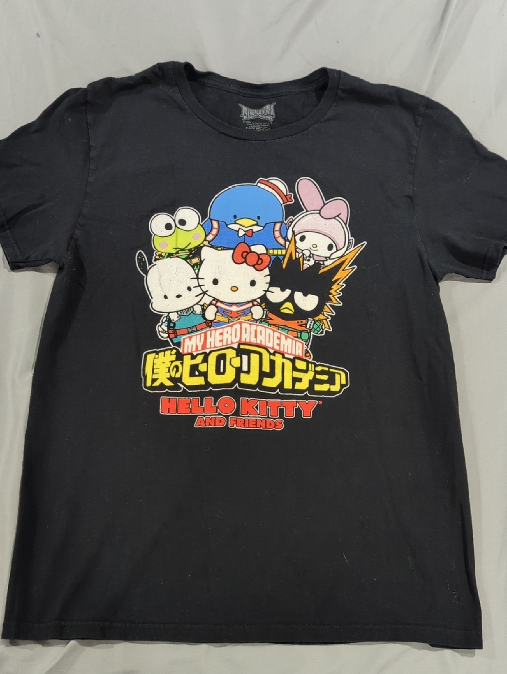 Hello Kitty Black Tee with Multicolor Character Graphic